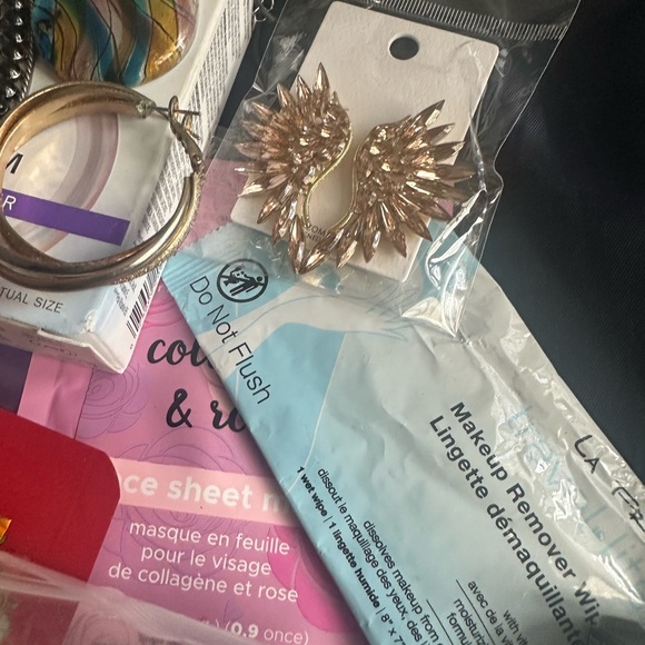 Michael Kors Navy and Cream Striped Tote stuffed with jewelry and skincare - Picture 10 of 10